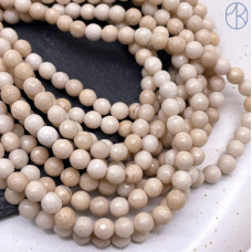 Белая речная яшма мелкая огранка 6 мм (128 граней)