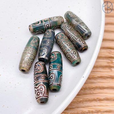 Бусина Дзи 17 глаз серо-зеленая бочонок 30*11 мм Бусина Дзи 17 глаз серо-зеленая бочонок 30*11 мм