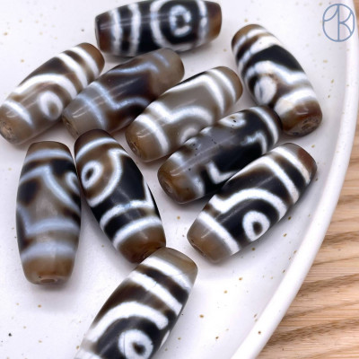 Бусина Дзи 2 глаза бело-серый бочонок 30х11 мм