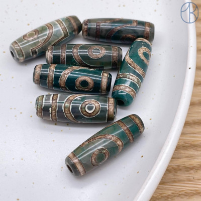 Бусина Дзи 2 глаза коричнево-зеленый бочонок 30х11 мм