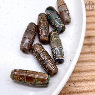 Бусина Дзи 2 глаза серо-коричневый бочонок 30х11 мм