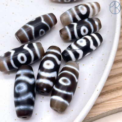 Бусина Дзи 3 глаза бело-серый бочонок 30х11 мм