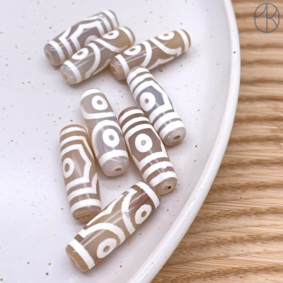 Бусина Дзи 3 глаза серо-белый бочонок №1 30х11 мм Бусина Дзи 3 глаза серо-белый бочонок №1 30х11 мм