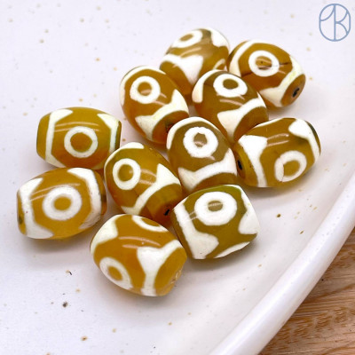 Бусина Дзи 3 глаза желто-белый бочонок уп. 5шт 14х10 мм