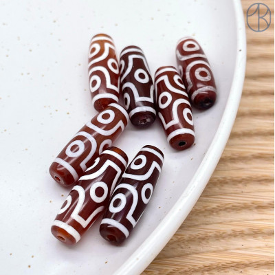 Бусина Дзи 6 глаз бело-коричневый бочонок 30*10 мм Бусина Дзи 6 глаз бело-коричневый бочонок 30*10 мм