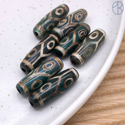 Бусина Дзи 6 глаз и черепаший панцирь серо-зеленый бочонок 30х11 мм