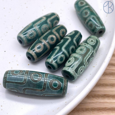 Бусина Дзи 9 глаз зеленый бочонок 40х14 мм 