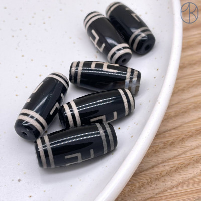 Бусина Дзи Хоту бело-черный бочонок 24х10 мм