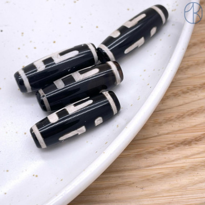 Бусина Дзи Хоту черно-белый бочонок 30*11 мм Бусина Дзи Хоту черно-белый бочонок 30*11 мм