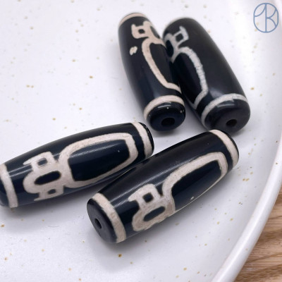 Бусина Дзи Кубера черно-белый бочонок 40х14 мм