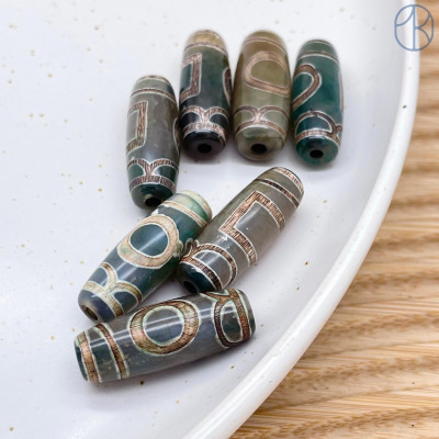 Бусина Дзи Небо и Земля серо-зеленый бочонок 30х11 мм Бусина Дзи Небо и Земля серо-зеленый бочонок 30х11 мм