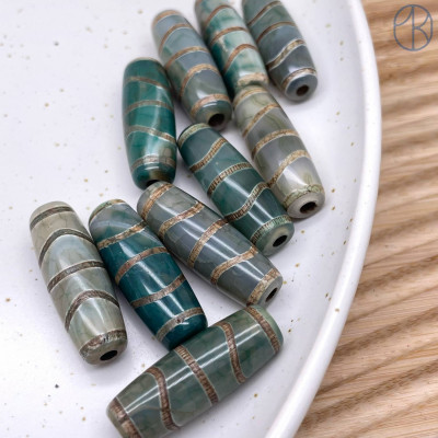 Бусина Дзи Волна серо-зеленый бочонок 30х10 мм