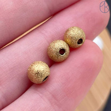 Бусина шар фактурный сталь 6 мм, цвет золото 18К Бусина шар фактурный сталь 6 мм, цвет золото 18К