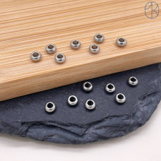 Бусина сталь, цвет серебро 4х2 мм Бусина сталь, цвет серебро 4х2 мм