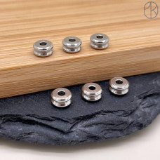 Бусина сталь двойная, цвет серебро 6х3 мм Бусина сталь двойная, цвет серебро 6х3 мм