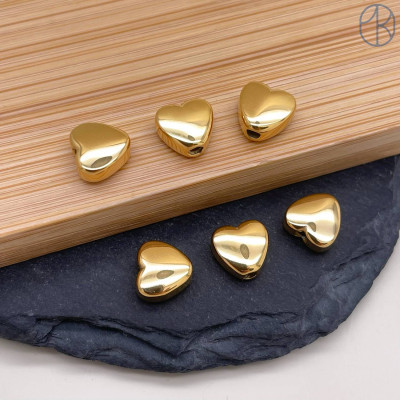 Бусина сталь сердце, цвет золото 7 мм