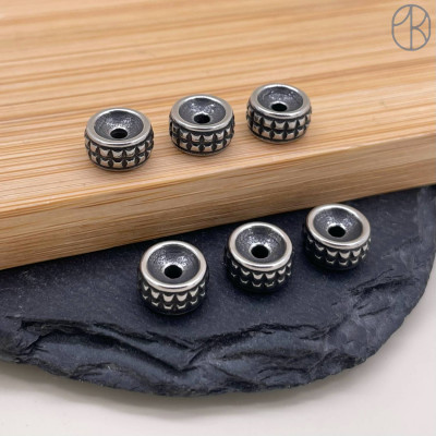 Бусина сталь точки 8х5 мм 