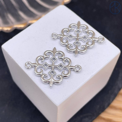 Коннектор национальный №22, цвет серебро 25 мм