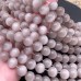 Кошачий глаз (стекло) сиреневый 10 мм 