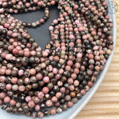 Родонит черно-розовый мелкая огранка 4 мм (128 граней)
