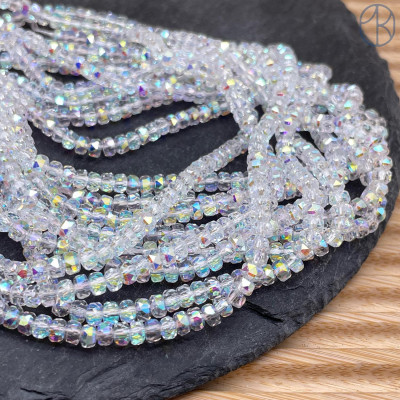 Стекло рондель огранка прозрачное с переливом 4х2 мм