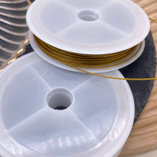 Тросик ювелирный цвет золото 0,6 мм