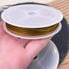 Тросик ювелирный цвет золото 0,6 мм