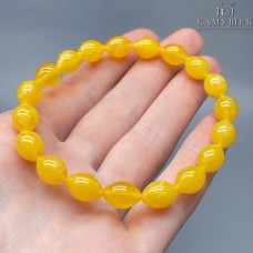 Янтарь желтый рис  7*11мм сет 20см
