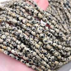 Яшма далматиновая рис 4х6 мм Яшма далматиновая рис 4х6 мм