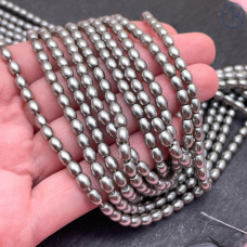 Жемчуг Майорка светло-серая рис 6х8 мм